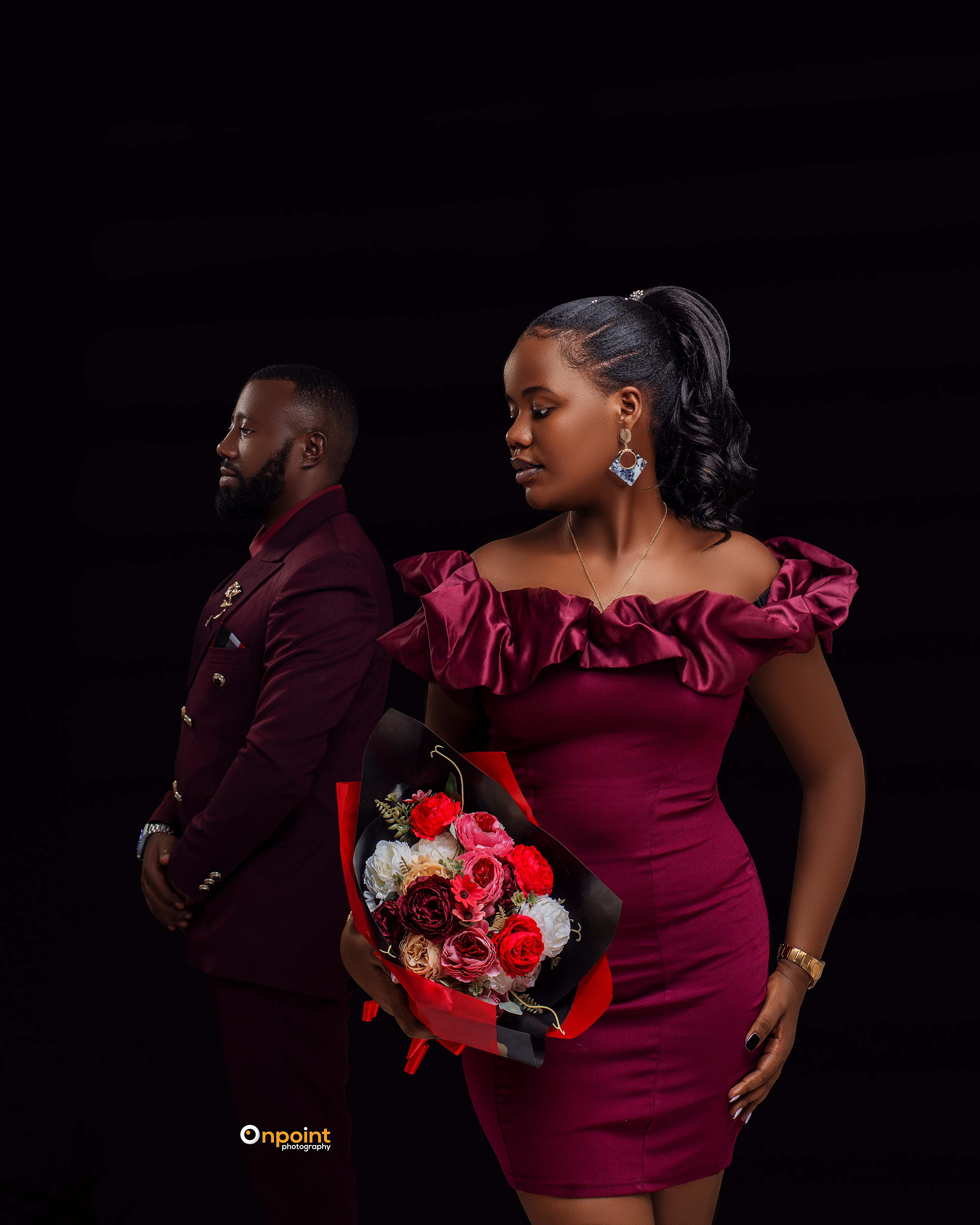 Elegant couples portrait with bouquet
